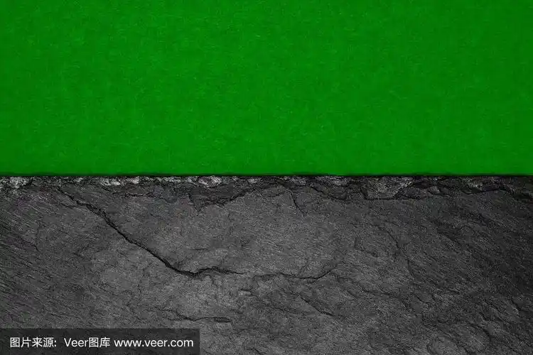 抽象的背景构图在半哑光的墨绿色纸和黑色的石材上用临摹空间