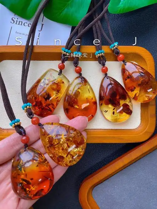 新到纯天然花珀爆花水滴吊坠配高