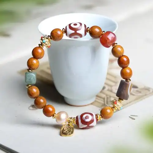 藏饰牦牛骨手串三眼天珠螺纹玛瑙珍珠贝中式手链文玩念珠饰品批发