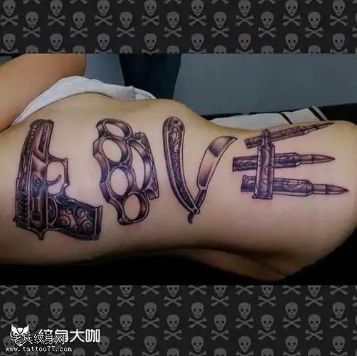 腰部枪纹身图案
