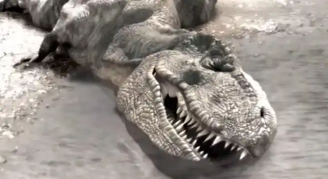 霸王龙杀死了甲龙大腿却被甲龙用尾巴打中最终也死了