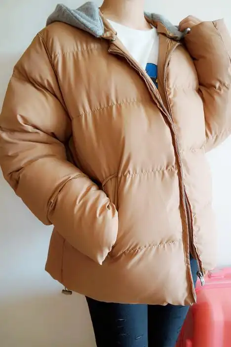 超厚羽绒服绵绵的,中国羽绒服在上个世纪80年代初开始流行,当时面料