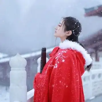 雪飘飘红衣带伞女生头像唯美古风真人头像