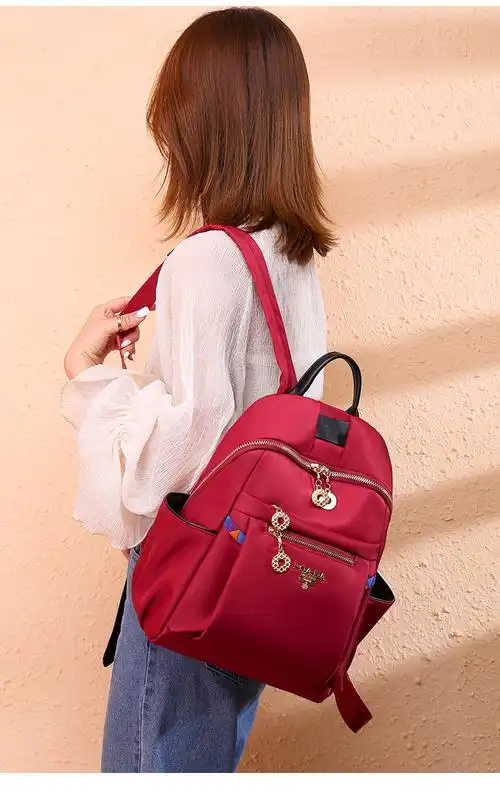 双肩包女2019新款牛津布大容量休闲旅游女士背包红色