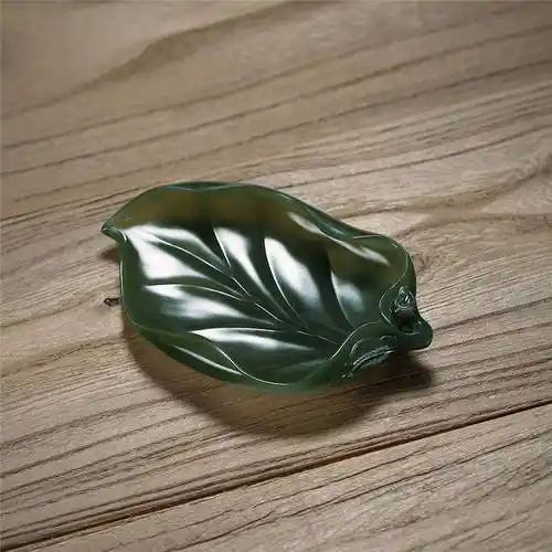 叶子雕刻玉雕的树叶是"金枝玉叶"这个词的真实写照,正是因为见的多了