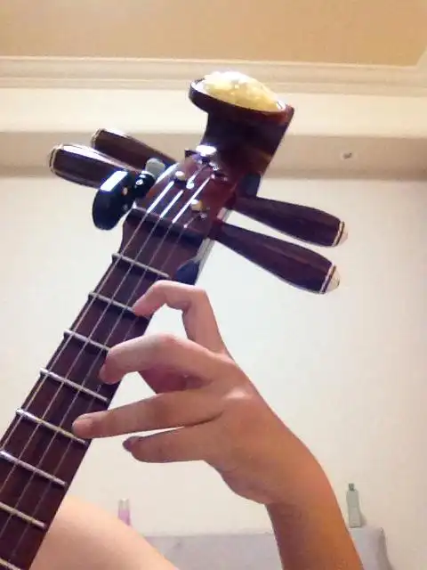 中阮按弦左手一指二指对不对不对应怎样 急急急求懂的人