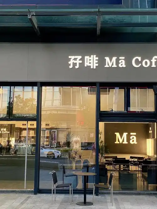 咖啡操作台银灰色不锈钢材质座客区磨砂颗粒桌椅也很耐看各种不同形状