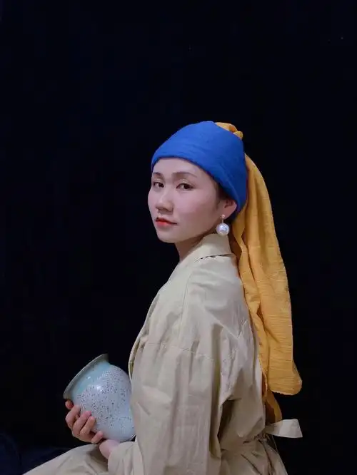 戴珍珠耳环的少女