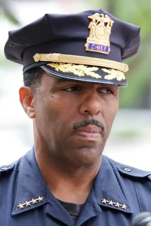 chaires trades badge for books