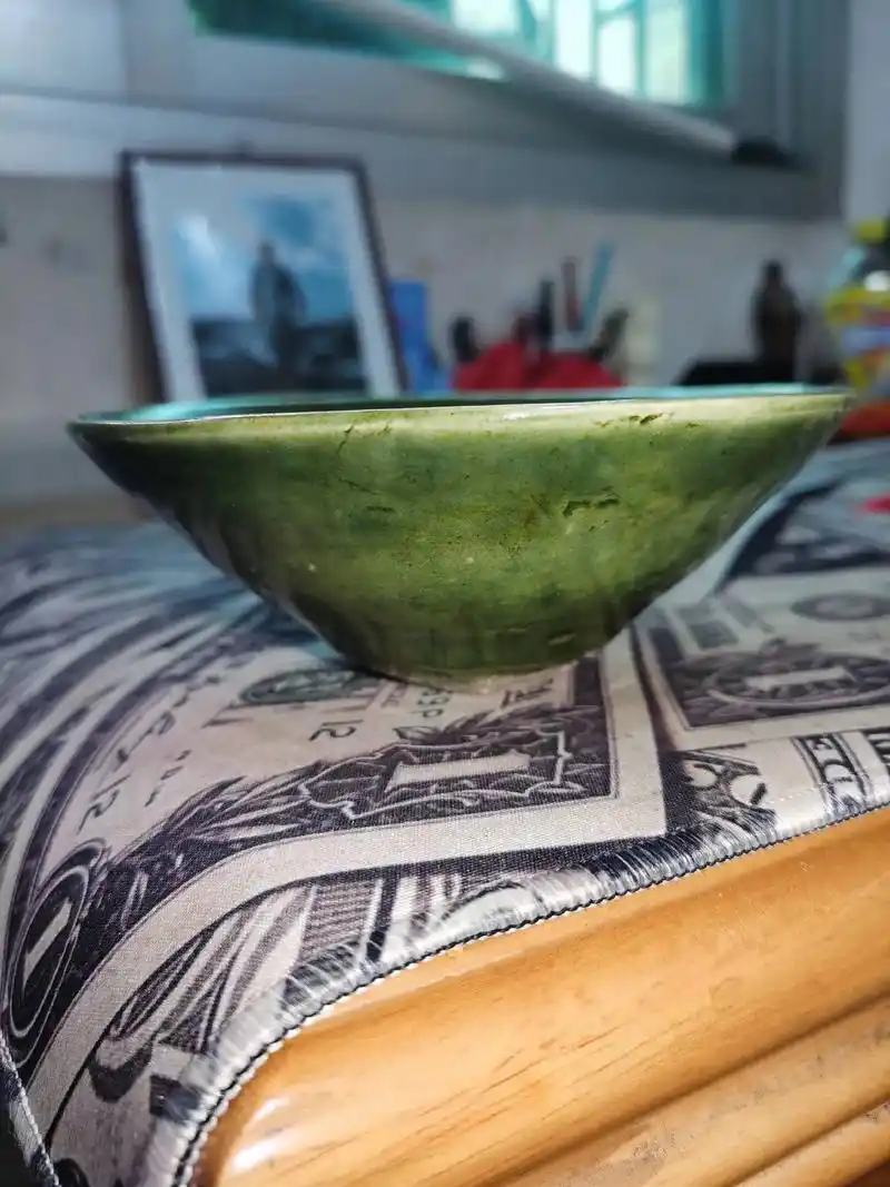 宋代吉州窑绿釉凤纹斗笠碗