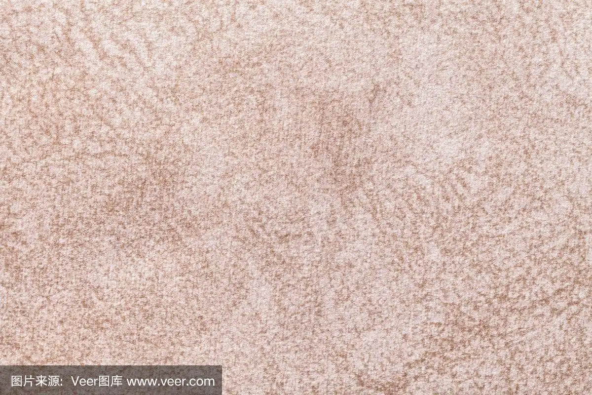 浅米色松软的背景,柔软,蓬松的布料.纺织品特写的纹理.