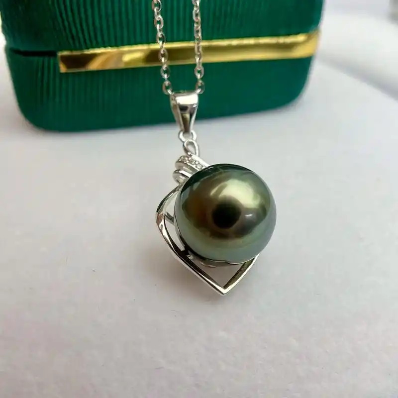 天然海水大溪地黑珍珠吊坠.一眼就心动的梦幻色,11.2mm圆 - 抖音