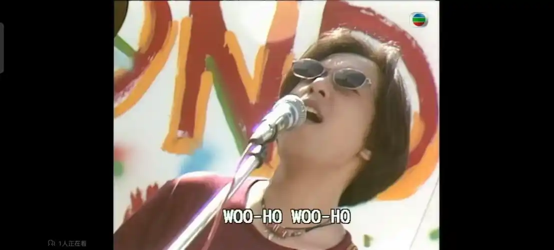 黄家驹:穿越都市的摇滚之声