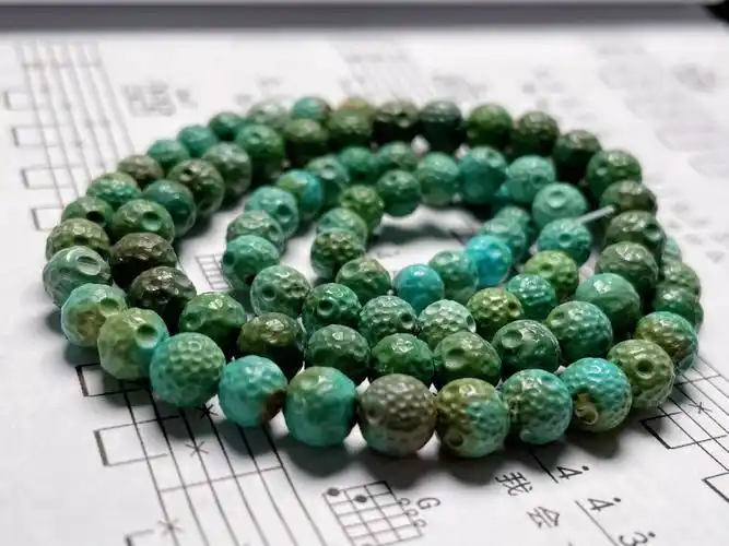 在这个阶段主要有:粉压,碳酸盐染色和菱镁矿高仿绿松石等几种主要的