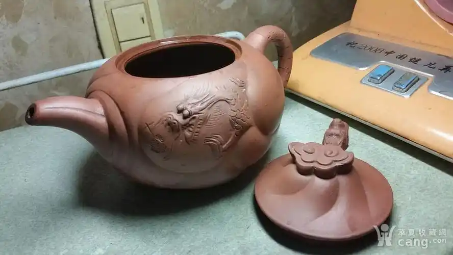杂项 紫砂壶 方建芬的文革精品大鱼化龙 藏品描述 藏品展示 报价记录