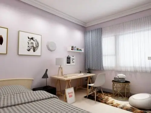 这个单人卧室比较素淡,明亮的几何地毯提升了现代主义效果.