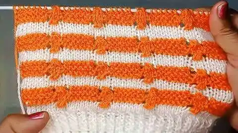 一款很漂亮的双色棒针花样,适合针织女童毛衣