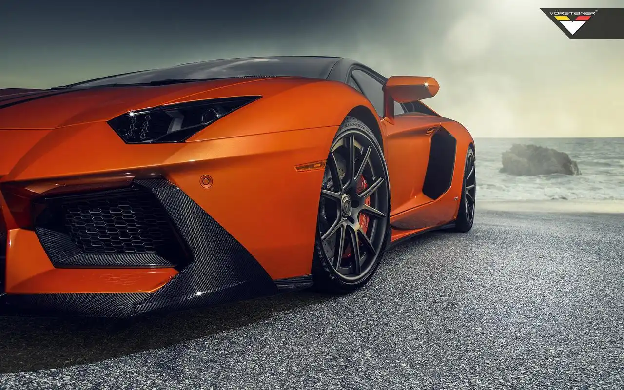 > 超酷兰博基尼炫彩橙色改装版跑车桌面壁纸(1920×1200)