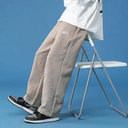 涤纶针织潮牌春秋休闲裤松紧街头束脚九分宽松裤子