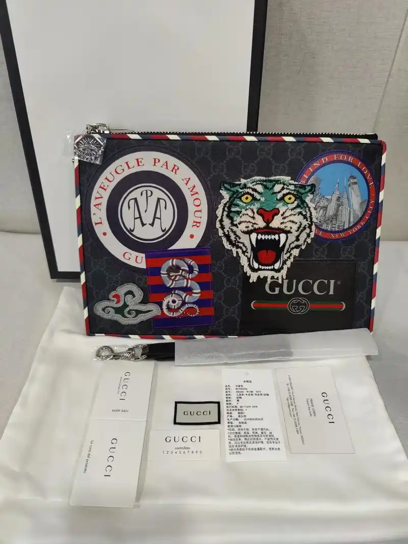 古驰手拿包.全新gucci古驰黑色刺绣ufo虎头包拉链手拿包 - 抖音