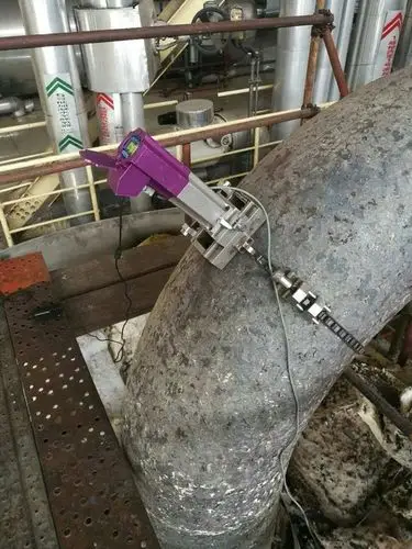 上海宝钢电厂高温再热蒸汽管道系统在役检测