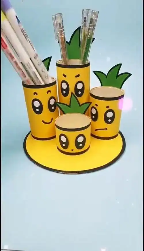 快来用废旧纸筒做个可爱的菠萝笔筒吧