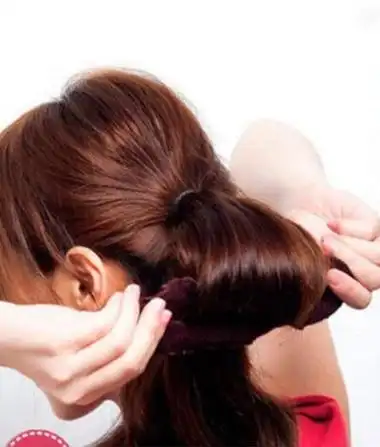 并用后面的头发将其掩盖,这款唯美又靓丽的鱼尾编发发型就算完成了!