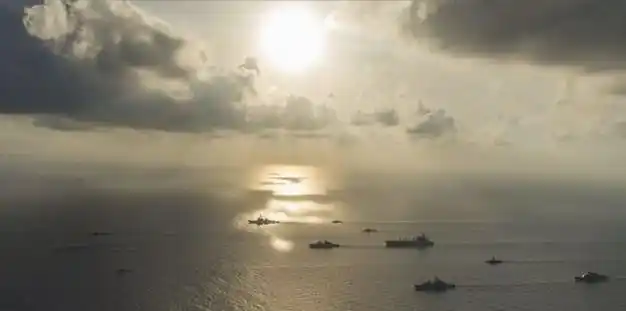 而解放军也立即行动,就在他们四国在南海宣布举行军事演习之际,中国