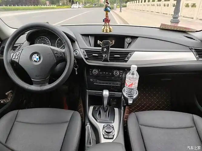 2012年12月进口宝马x1,白外黑内,全车原漆,明盘4万3