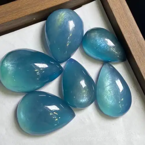 天然魔鬼蓝海蓝宝水滴吊坠裸石 蓝荧光晶体透海蓝宝爆闪猫眼吊坠