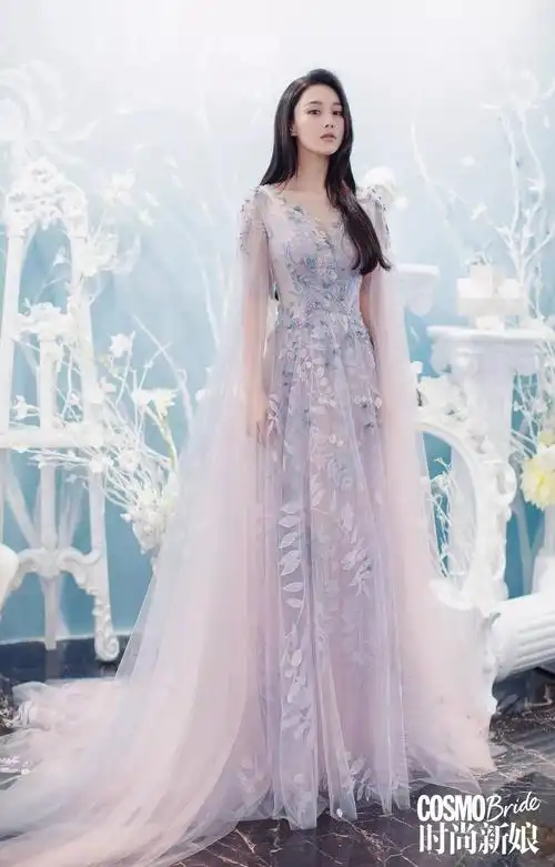 张馨予唐艺昕王黎雯为什么越来越多的女明星都选择国牌婚纱