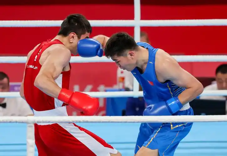 中国拳手托合塔尔别克61唐拉提汗晋级男子80公斤级决赛