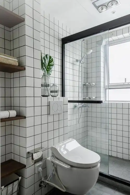 卫生间:墙砖采用小白砖,使整个空间明亮大方.