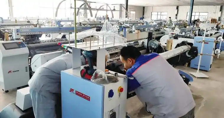 眉县华纶纺织高端工装面料生产线项目加紧调试设备争取早日投产