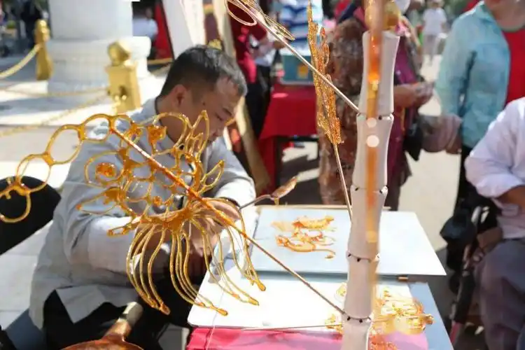 秋分至逛集市南门社区传统民俗文化活动受追捧