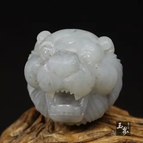 墨玉-虎头把件_手把件_玉界臻品玉雕艺术中心