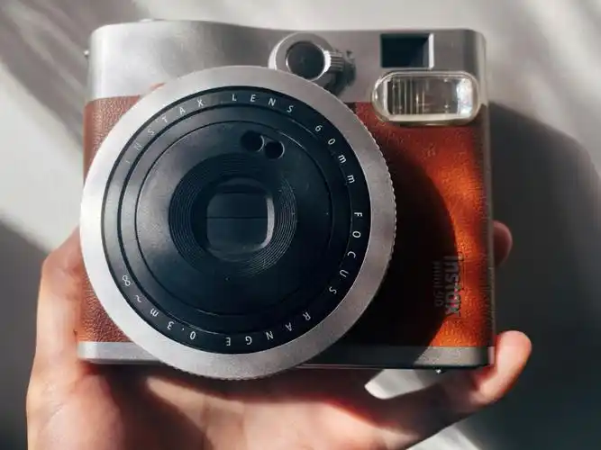 拍立得也是爱的相机之一呀!99型号:富士90.有黑色和我这个棕色.