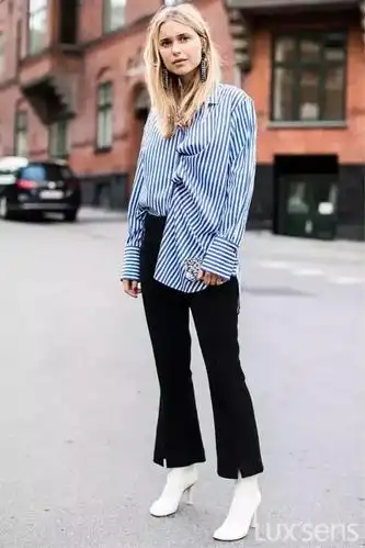 法,纽扣扣错位更加 fashion~将等水平的扣子错位扣,再将一边衬衫固定