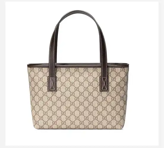 gucci/古驰时尚休闲女士帆布/配皮手提包