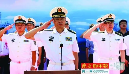 2016年7月15日,时任南海舰队司令员的沈金龙参加新战舰入列仪式.