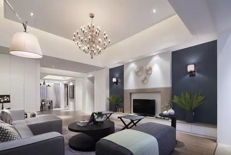 客厅活泼的果绿色称映着入户正面的一幅抽象创意画,灰色的基调,跳动的