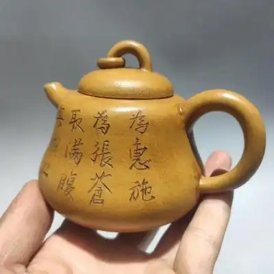 宜兴紫砂壶 陈曼生制 原矿紫砂 曼生壶
容量 3