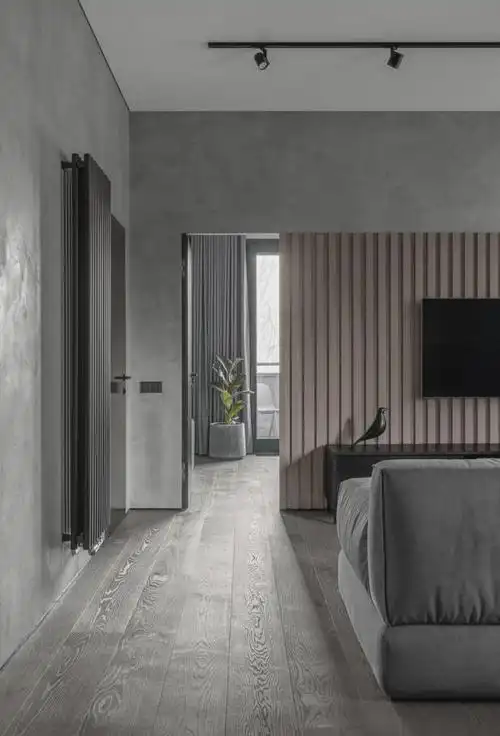 一间75平米的水泥灰公寓,利用色彩的装饰,拥有时髦与平衡感