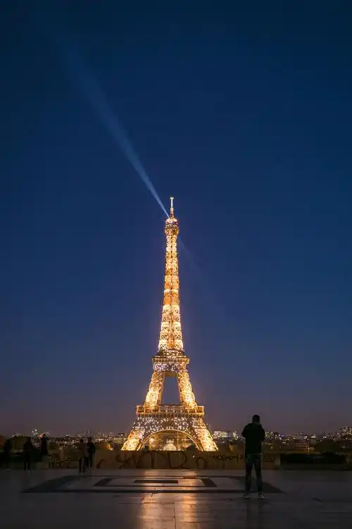 eiffel tower with lights during night time
