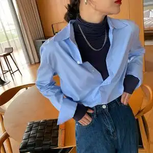 2021年早春装新款浅蓝色衬衫女设计感小众雾霾蓝复古港味叠穿衬衣