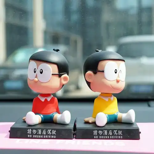 哆啦a梦大雄机器猫抽烟表情摇头公仔汽车摆件动漫手机座 车内饰品