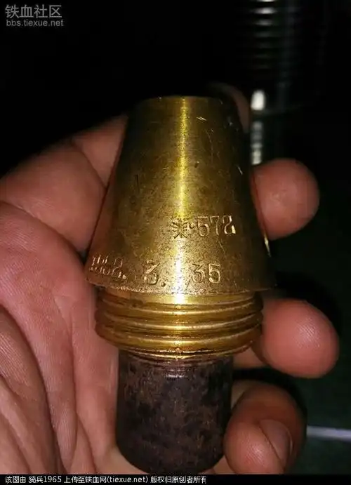 原创〕一枚少见的52年东北兵工厂生产的82mm迫击炮弹引信