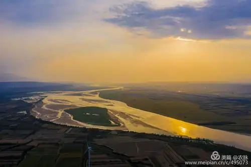 风车悠悠转,长河落日圆 ————故乡灵宝航拍黄河落日