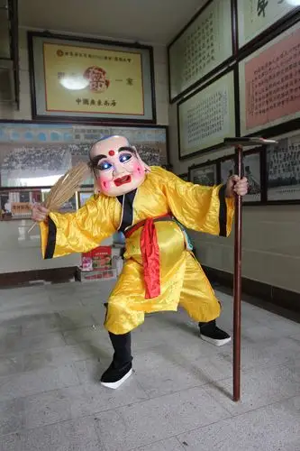 梁光泰人见人爱智趣鬼马的大头佛欢笑了一代代西樵人