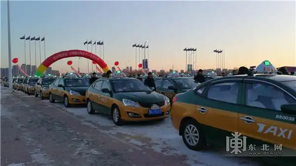 哈尔滨市出租车冰雪立誓言文明出行热情服务我先行